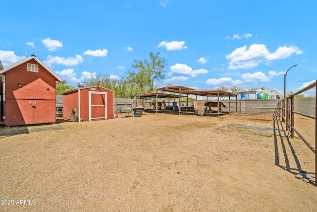 37508 N 12th St, Phoenix, AZ 85086 - view of yard with an outbuilding, a storage shed, a carport, and an exterior structure