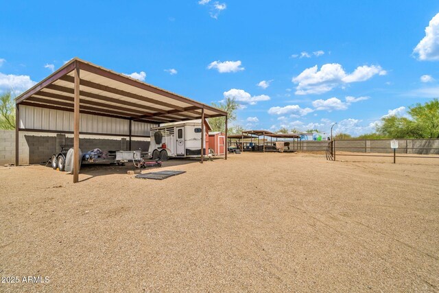 37508 N 12th St, Phoenix, AZ 85086 - view of parking featuring a carport and fence