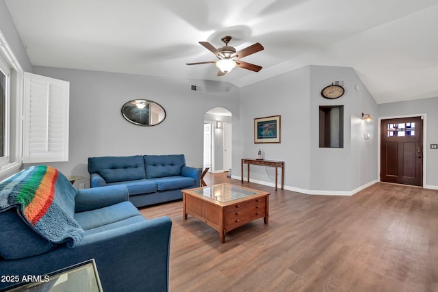 37508 N 12th St, Phoenix, AZ 85086 - living area with arched walkways, ceiling fan, wood finished floors, lofted ceiling, and baseboards