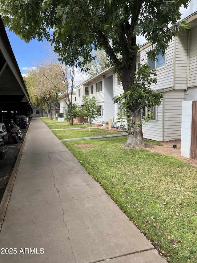 view of yard featuring a residential view