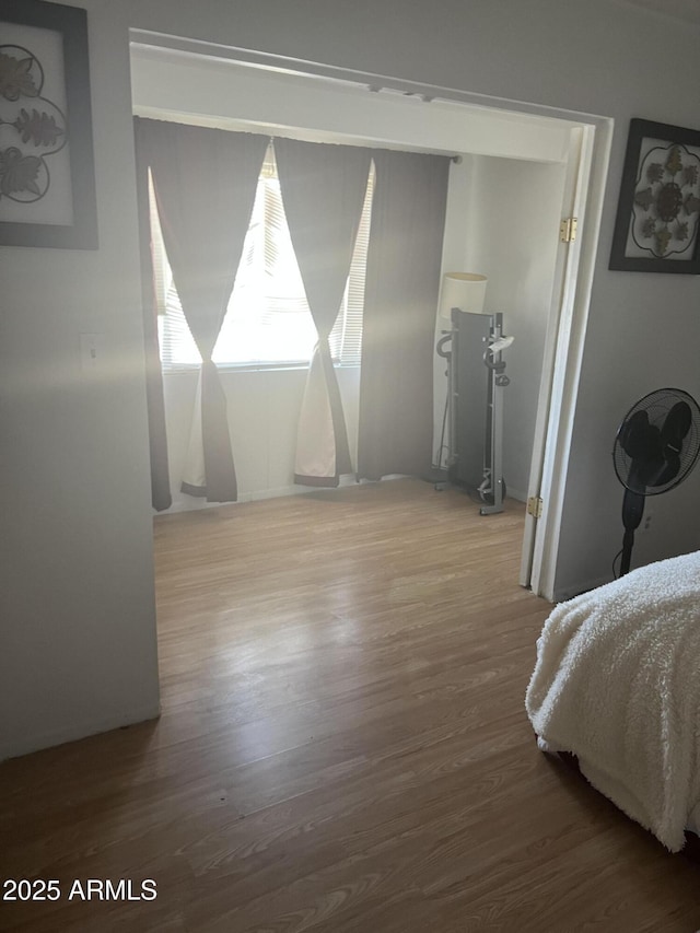 bedroom featuring wood finished floors