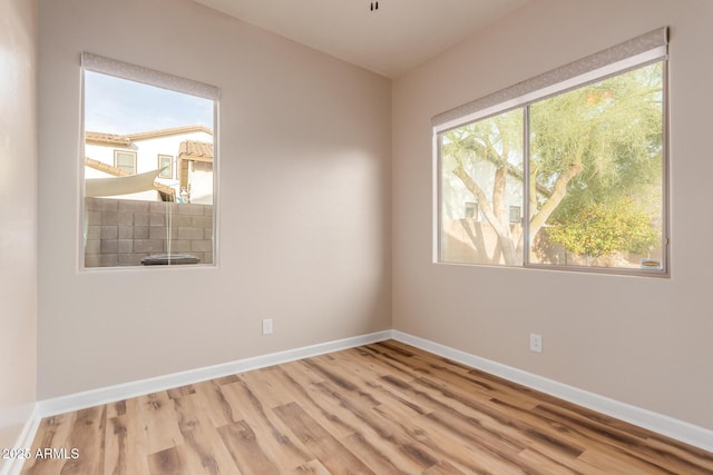 empty room featuring light hardwood / wood-style floors