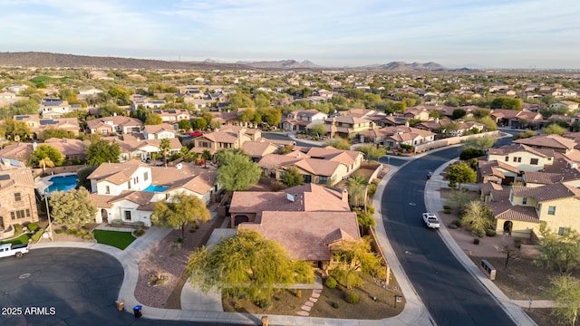 drone / aerial view featuring a mountain view