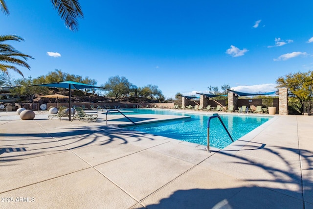 view of pool featuring a patio area