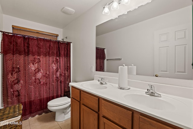 full bathroom with vanity, toilet, tile patterned floors, and shower / tub combo with curtain