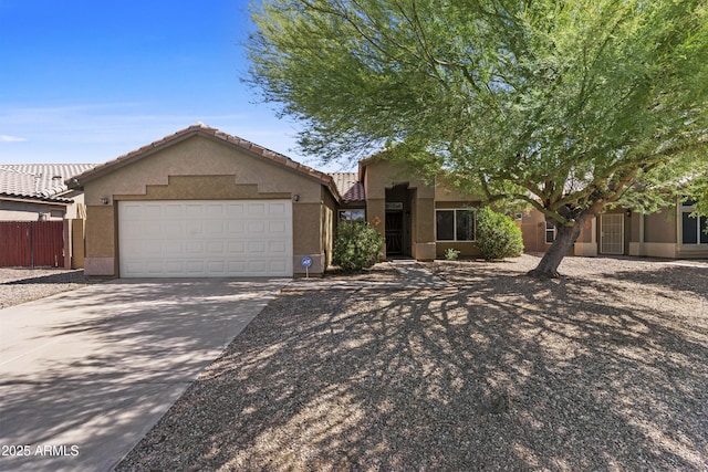 10727 E El Moro Ave, Mesa, AZ 85208 - view of front of house with an attached garage, stucco siding, concrete driveway, and a tiled roof