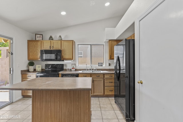 10727 E El Moro Ave, Mesa, AZ 85208 - kitchen featuring black appliances, light tile patterned floors, a kitchen island, and recessed lighting