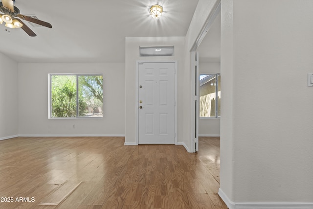 10727 E El Moro Ave, Mesa, AZ 85208 - foyer entrance featuring a ceiling fan and wood finished floors