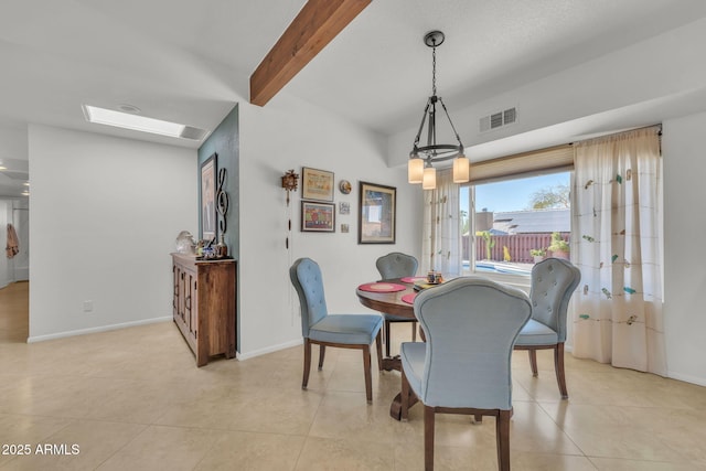 dining area with beam ceiling, visible vents, baseboards, and light tile patterned flooring