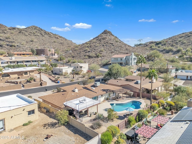 drone / aerial view with a residential view and a mountain view