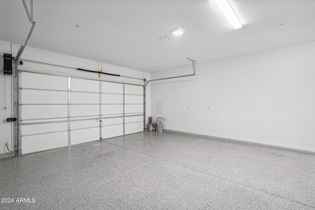 garage featuring baseboards