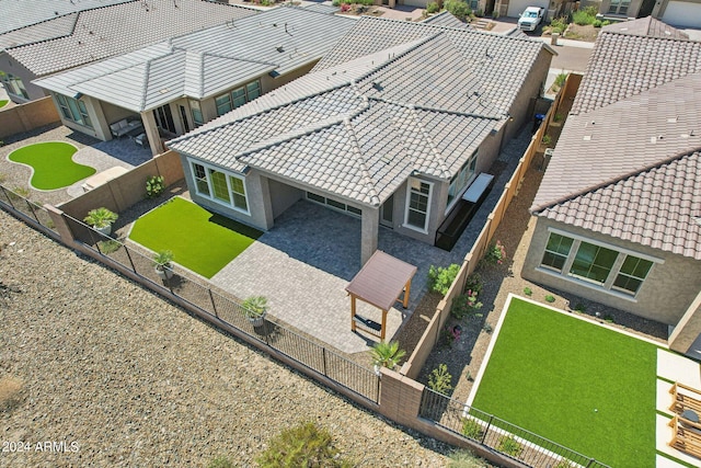 birds eye view of property with a residential view