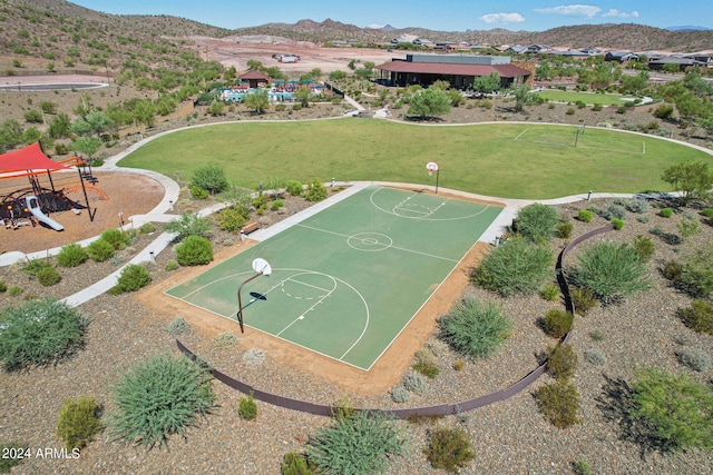 view of basketball court with a mountain view and community basketball court