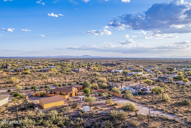 drone / aerial view with a residential view and a mountain view