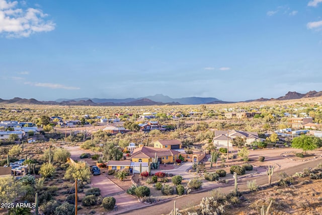 birds eye view of property featuring a mountain view and a residential view