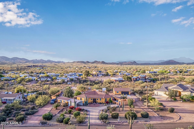birds eye view of property featuring a residential view and a mountain view