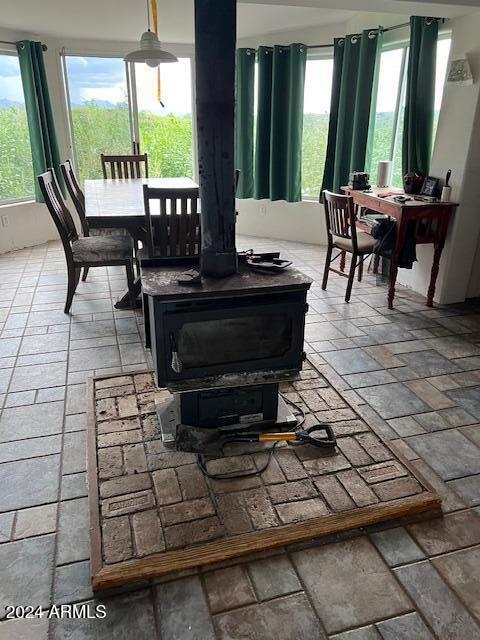 14565 W Hardscrabble Rd, Arivaca, AZ 85601 - interior space with a wood stove