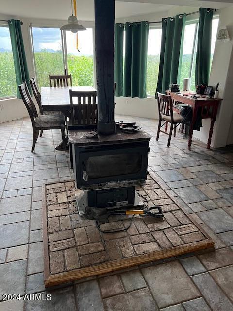 interior space with a wood stove