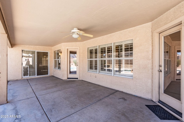 view of patio / terrace featuring a ceiling fan