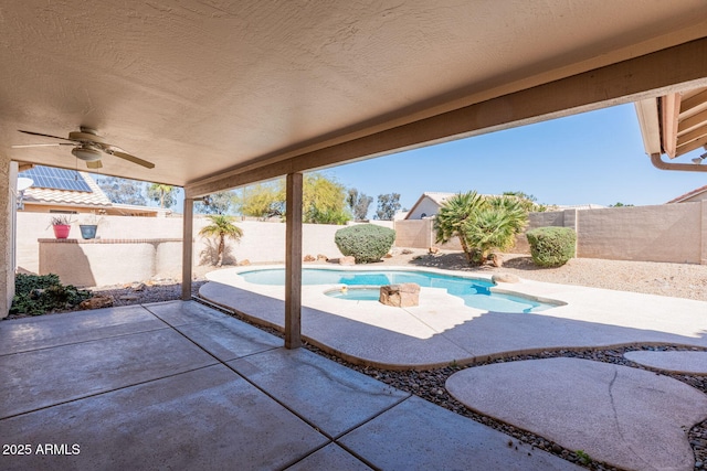 view of pool with a patio area, a fenced in pool, a fenced backyard, and ceiling fan