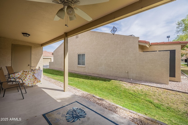 view of patio / terrace with a ceiling fan