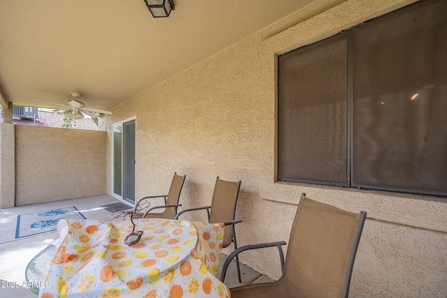 view of patio featuring a ceiling fan