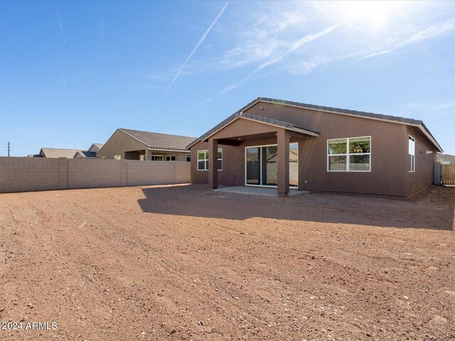 rear view of house featuring a patio area