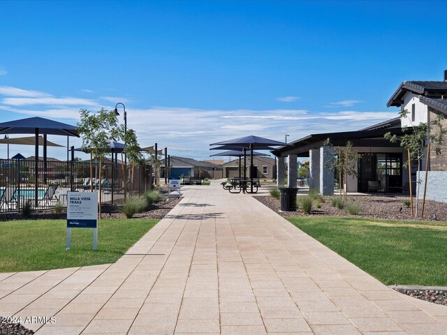 view of home's community featuring a lawn