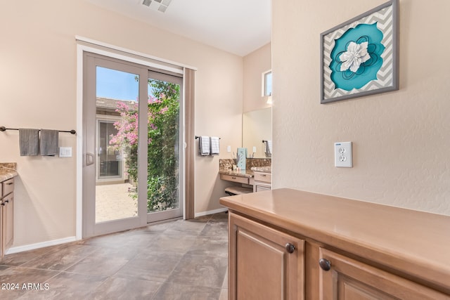 entryway with tile patterned flooring