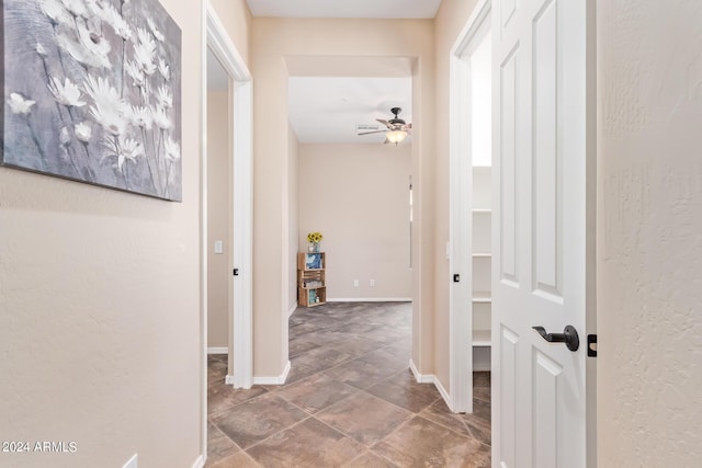 hall featuring tile patterned floors