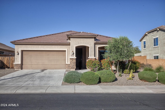 view of front of home with a garage