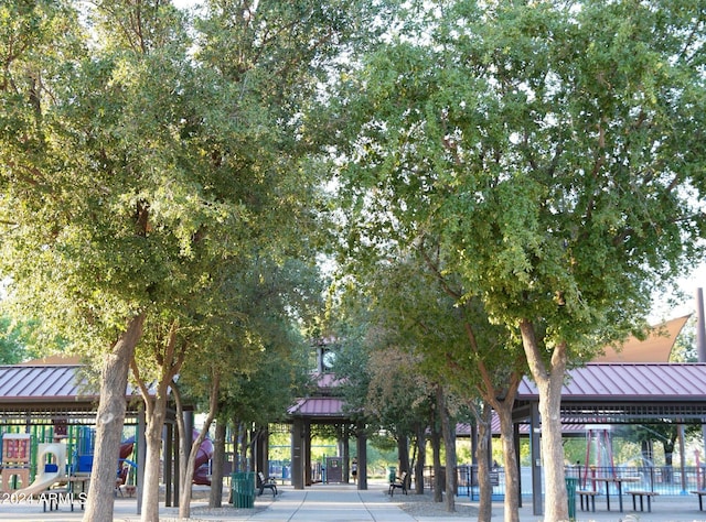 view of property's community with a gazebo and a playground