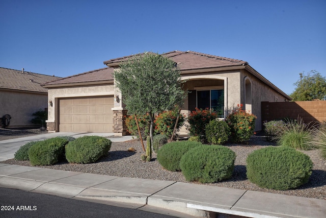 view of front of home with a garage