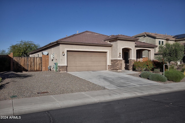 view of front of property with a garage