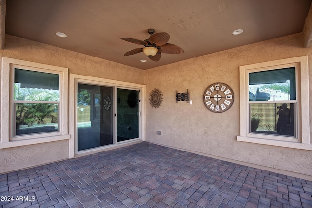 view of patio / terrace featuring ceiling fan