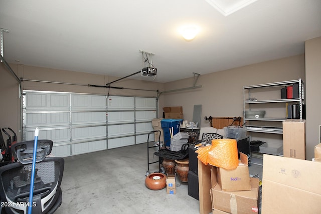 garage featuring a garage door opener