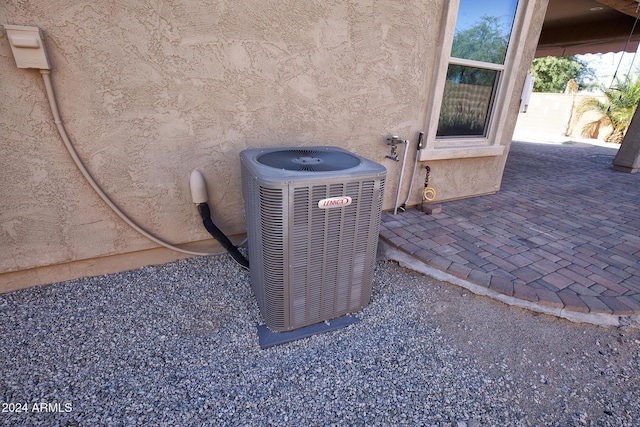 exterior details featuring cooling unit