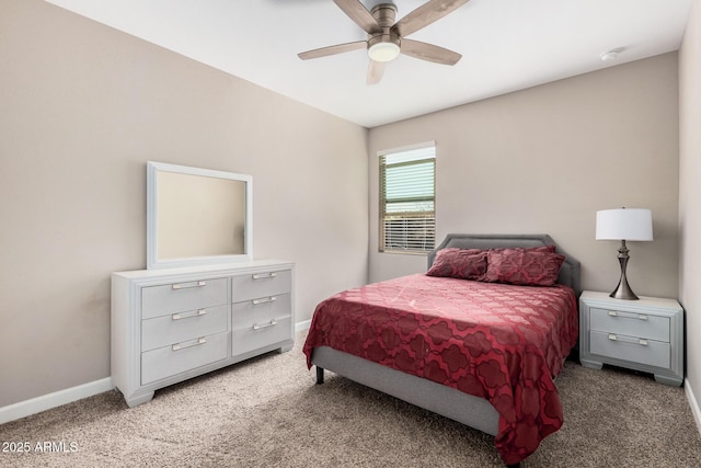 bedroom featuring baseboards, a ceiling fan, and light colored carpet