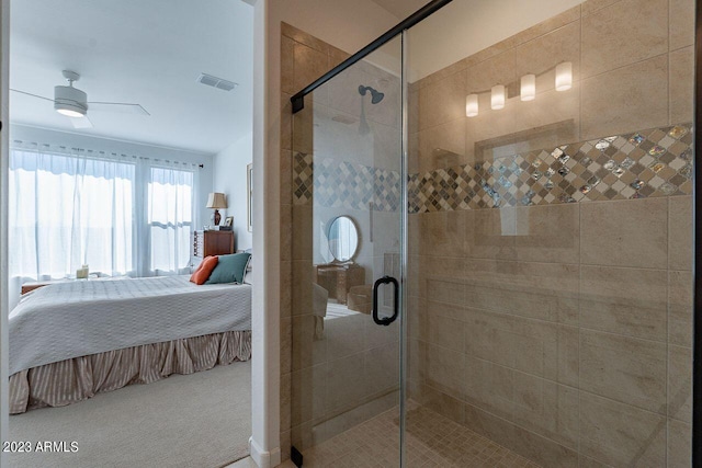 bathroom featuring walk in shower and ceiling fan