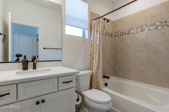 full bathroom with shower / tub combo, vanity, and toilet