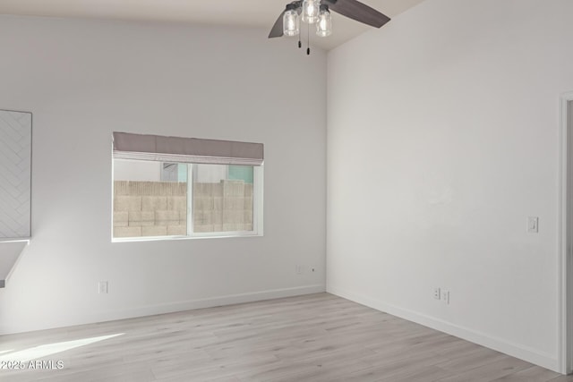 spare room with ceiling fan and light hardwood / wood-style floors