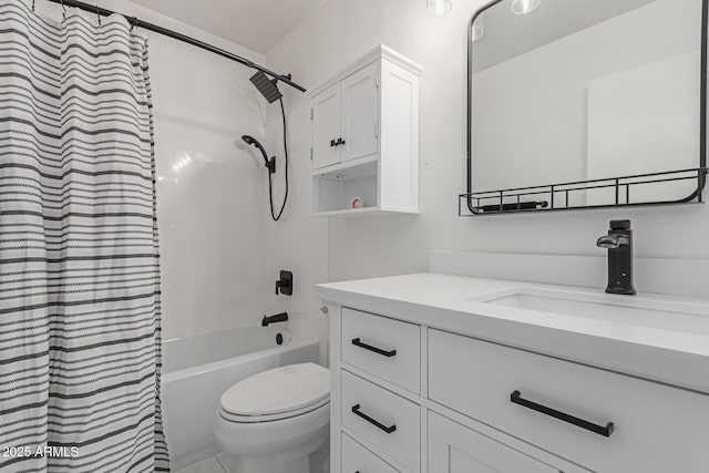 full bathroom featuring vanity, bathtub / shower combination, and toilet