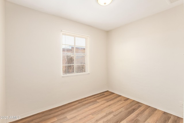 122 N 5th St, Avondale, AZ 85323 - spare room with light wood finished floors
