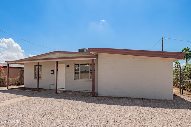 122 N 5th St, Avondale, AZ 85323 - view of front of property with concrete block siding and brick siding