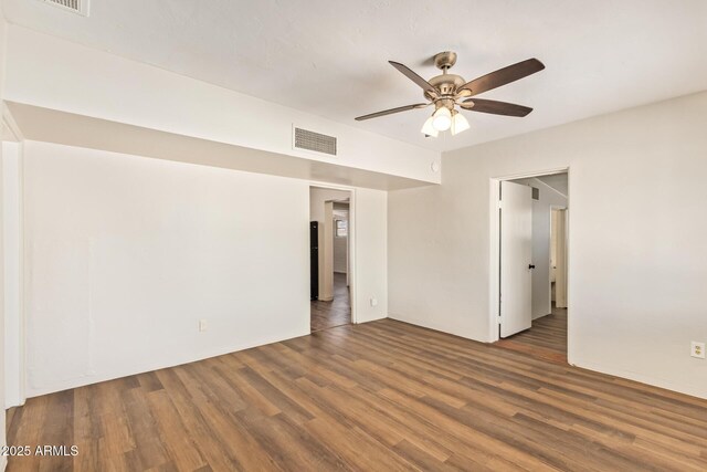 122 N 5th St, Avondale, AZ 85323 - empty room featuring wood finished floors and ceiling fan