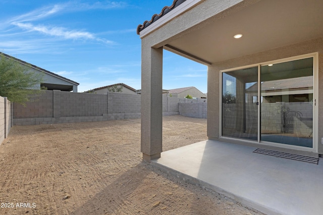 view of yard with a patio area and a fenced backyard