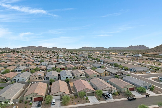 birds eye view of property featuring a residential view and a mountain view