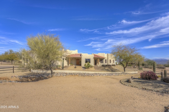 view of adobe home