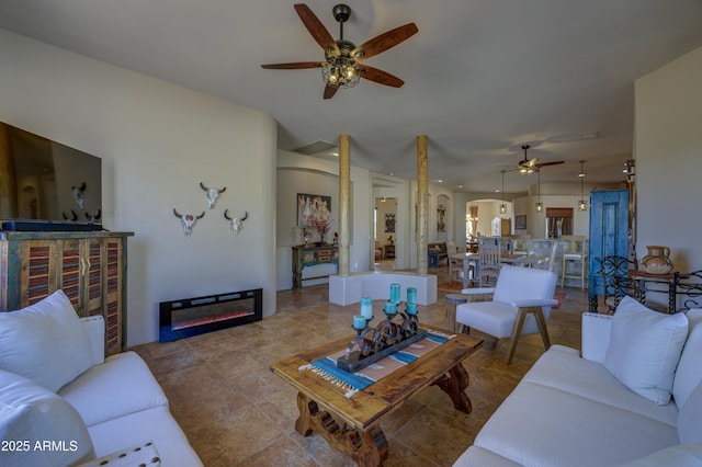 living room with ceiling fan