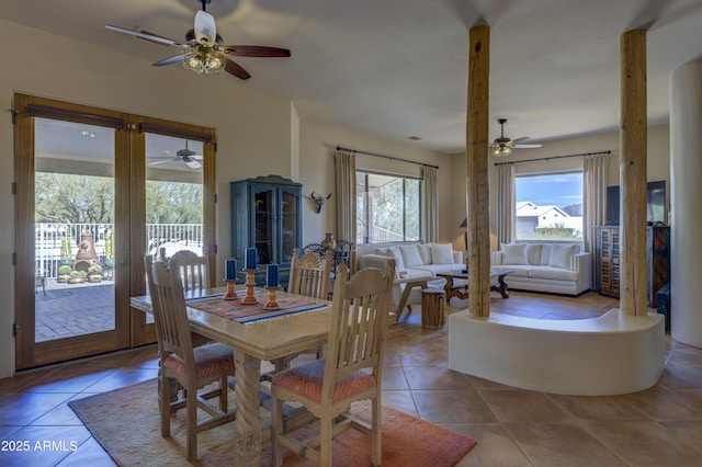 dining area featuring light tile patterned floors